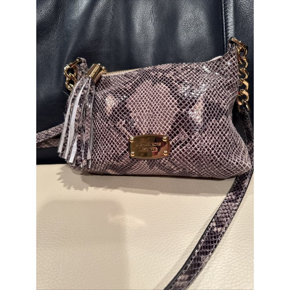 Michael Kors snakeskin-print leather crossbody bag with a tassel accent